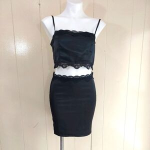 Pin-Up Black Bullet Lace Bra Top & Corset Mini Skirt. A playful lace dress with